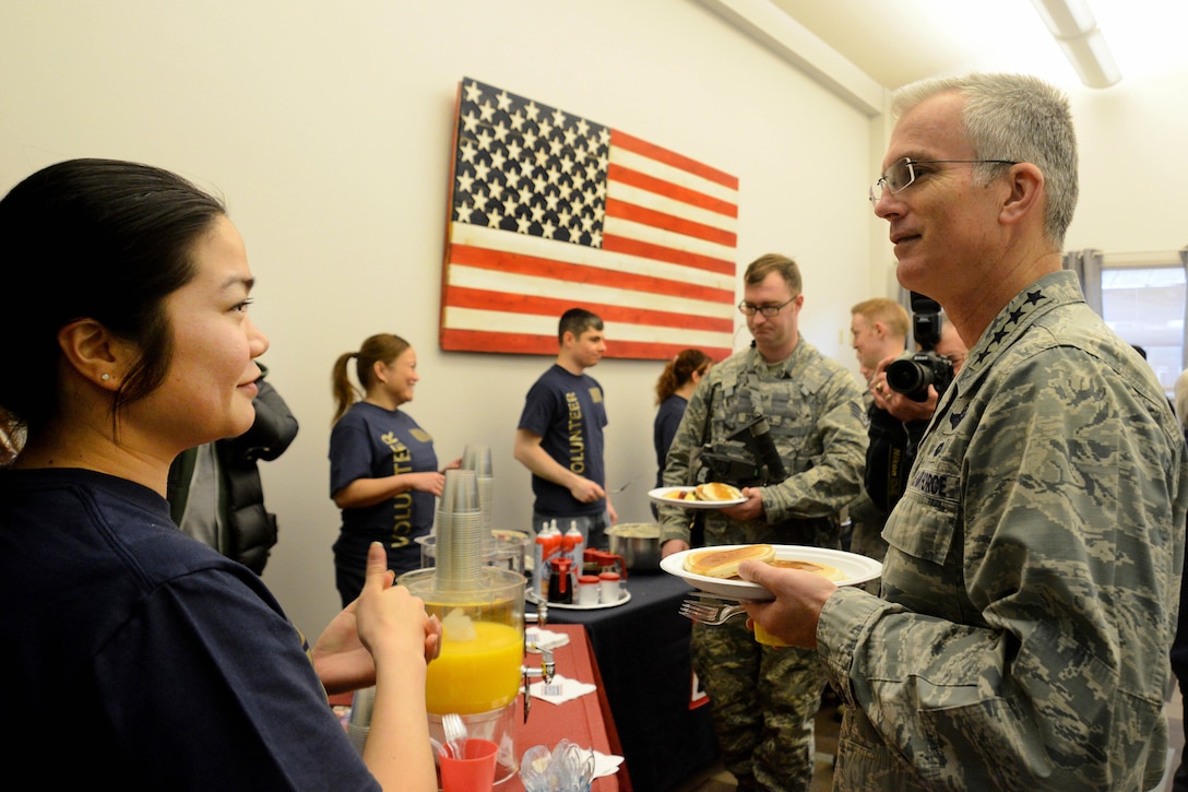 Air Force Gen. Paul J. Selva, right, vice chairman of the Joint Chiefs of Staff, talks with a USO volunteer during the USO spring tour on Joint Base Elmendorf-Richardson, Alaska, March 12, 2016. Air Force photo by Airman 1st Class Christopher R. Morales