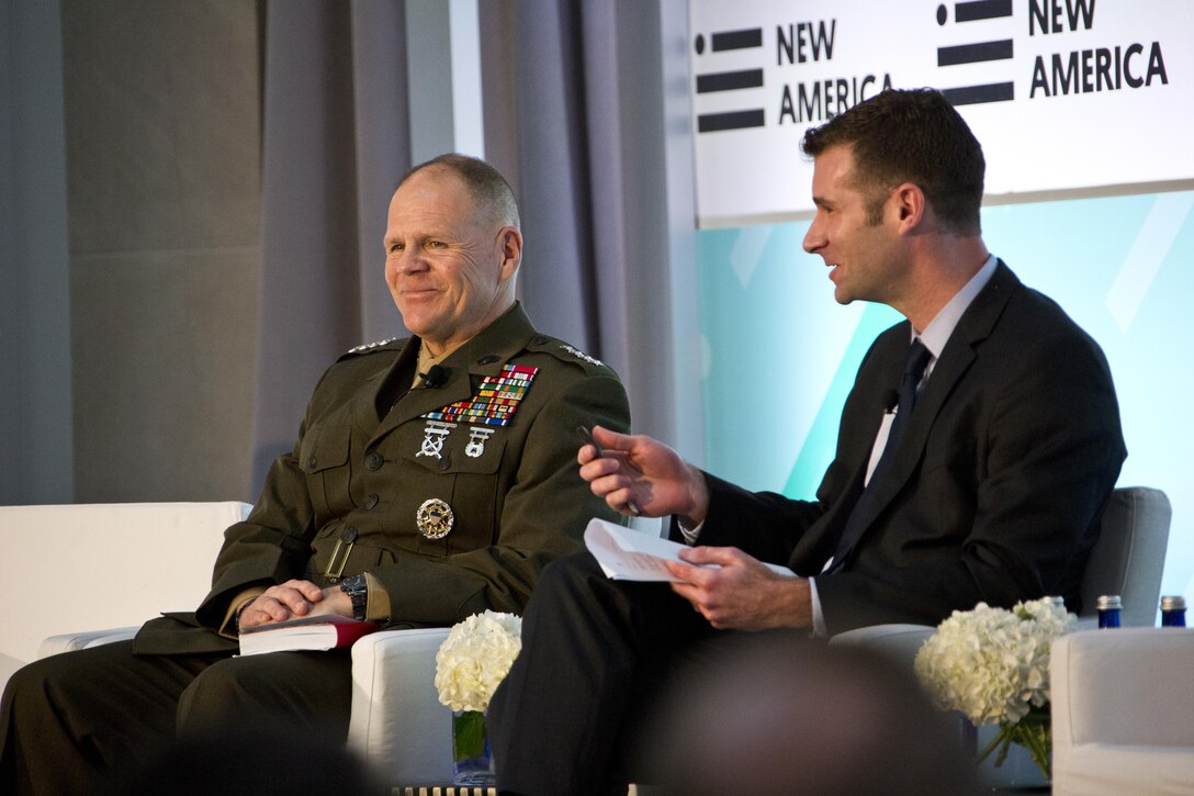 Commandant of the Marine Corps Gen. Robert B. Neller laughs next to Peter W. Singer, strategist for the New America Foundation, during the Future of War conference at Washington, D.C., March 10, 2016. Neller discussed challenges the Marines will likely face in the future and answered questions from the audience. (U.S. Marine Corps photo by Staff Sgt. Gabriela Garcia/Released)