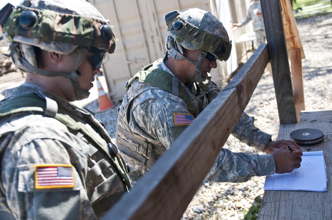 Spc. Saul Mercado, a horizontal construction engineer with the 475th Construction Company (Horizontal), an Army Reserve unit from Puerto Rico, writes down measurements for repairs to a set of stairs during Combat Support Training Exercise 78-16-01 at Fort Hunter Liggett, Calif., March 8, 2016. CSTX 78-16-01 is a U.S. Army Reserve exercise conducted at multiple locations across the country designed to challenge combat support units and Soldiers to improve and sustain skills necessary during a deployment. (U.S. Army photo by Staff Sgt. Dalton Smith/Released)