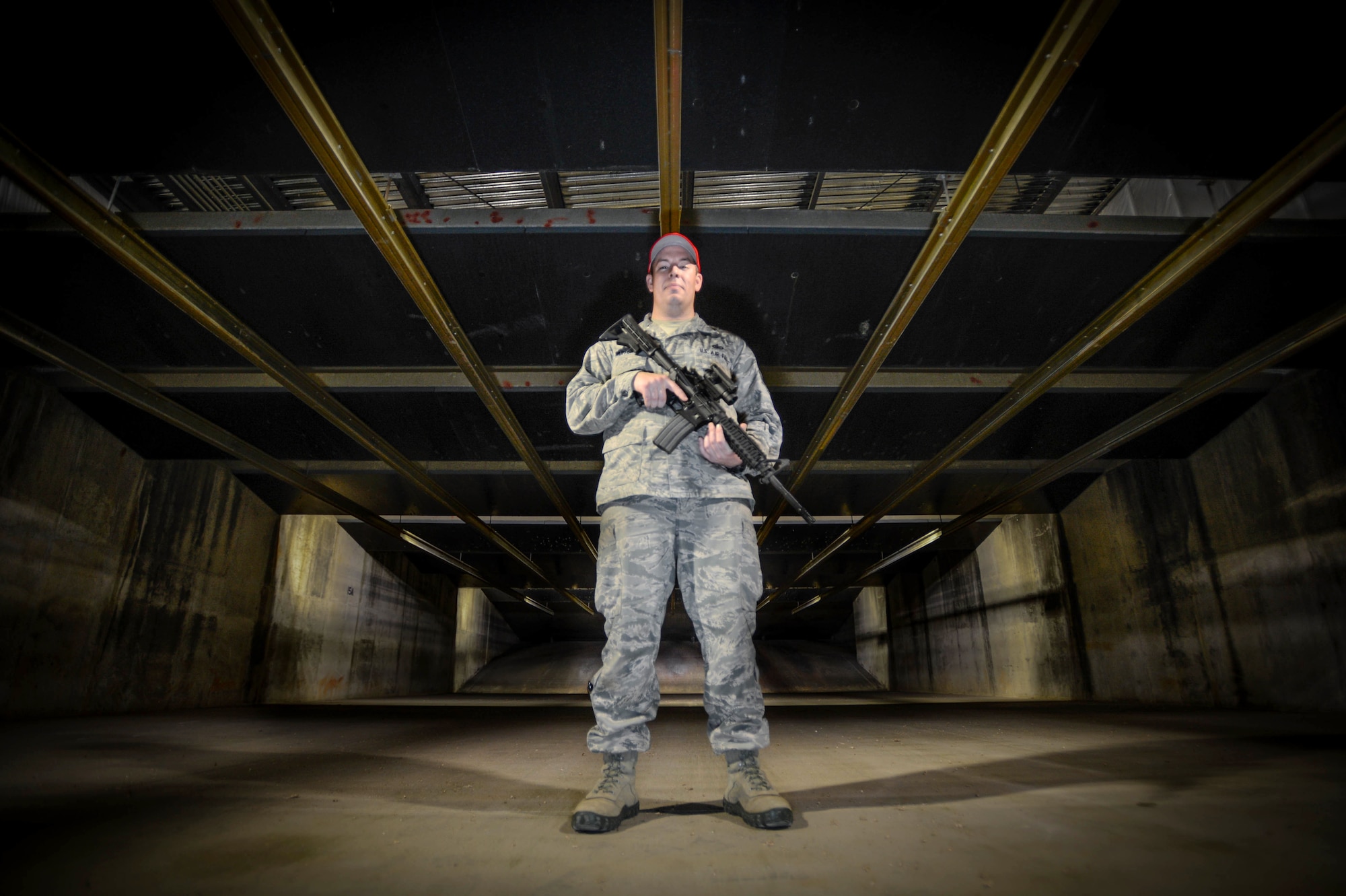 U.S. Air Force Staff Sgt. Jason Mufford, 20th Security Forces Squadron combat arms instructor, holds an M4 carbine at Shaw Air Force Base, S.C., March 9, 2016. Mufford’s primary duty is to teach Team Shaw members about various weaponry to ensure their safety during future operations. (U.S. Air Force photo by Senior Airman Jensen Stidham)