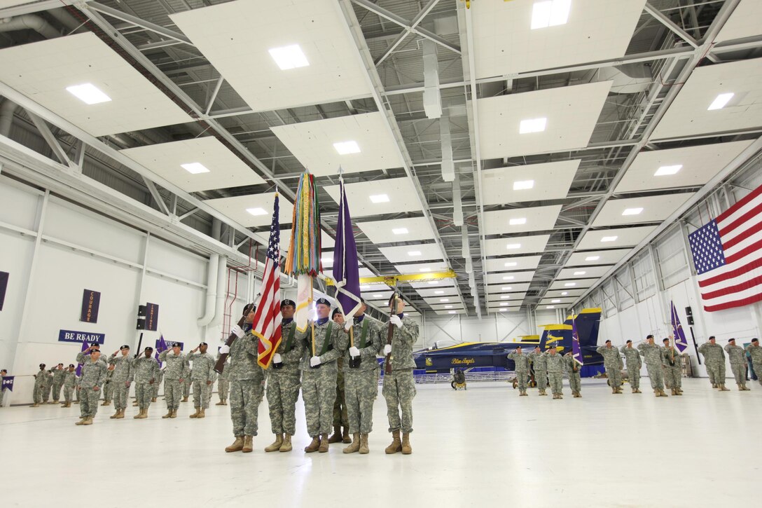 Soldiers from the 350th Civil Affairs Command welcome newly promoted Brig. Gen. Jeffrey Coggin during an assumption-of-command ceremony held at Naval Air Station Pensacola on March 12.