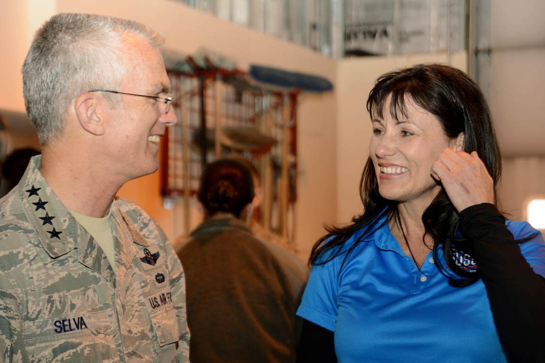Air Force Gen. Paul J. Selva, left, vice chairman of the Joint Chiefs of Staff, talks with the USO staff coordinator during the USO spring tour on Joint Base Elmendorf-Richardson, Alaska, March 12, 2016. Air Force photo by Airman 1st Class Christopher R. Morales