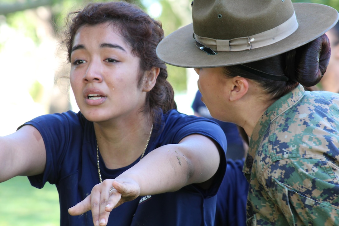 Drill Instructor Staff Sgt. Kayla Cerda commands Celeste Ybarra from Recruiting Sub Station Eagle Rock of Recruiting Station Los Angeles, to run in place during a female pool function at the Sherman Oaks Recreation Park in Van Nuys, Calif., March 12, 2016. (U.S. Marine Corps photo by Staff Sgt. Alicia R. Leaders/Released)