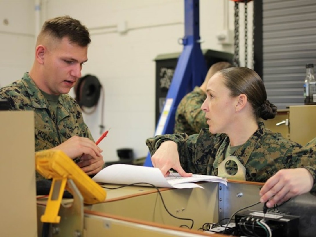 Marines attending Advanced Engineer Equipment Electrical Systems Technician course 1-16 (AEEEST 1-16) aboard Marine Corps Engineer School, Camp Lejeune, N.C. conduct a practical application on how to troubleshoot and diagnose electrical problems on a load bank.
