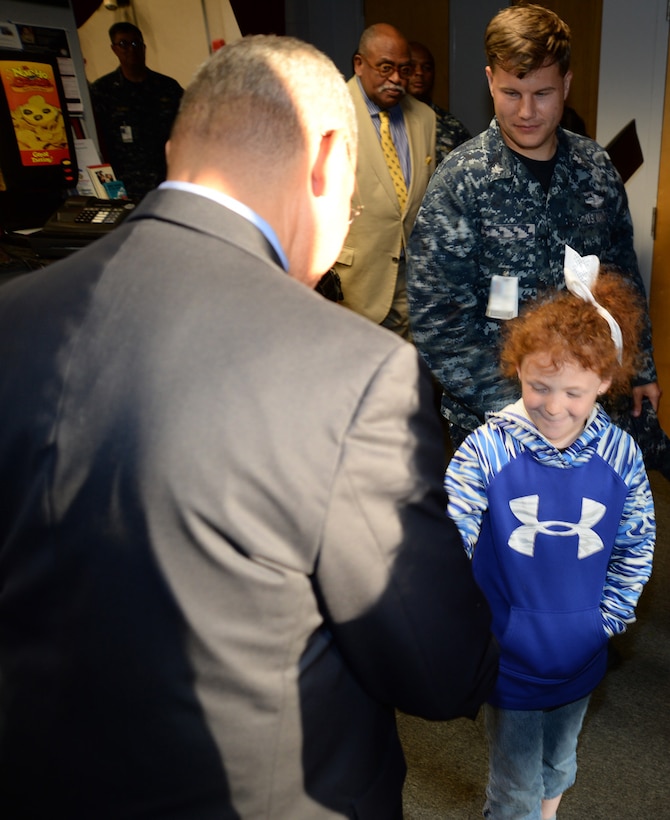 U.S. Rep. Sanford D. Bishop, member of Congress, meets with service members and their family members after a town hall at the Base Theater aboard Marine Corps Logistics Base Albany, March 9.  Bishop serves as co-chair of the Congressional Military Family Caucus and listened to service members as they asked various questions following his remarks about current and past legislation involving pay, health and education benefits, housing and other issues affecting military families.