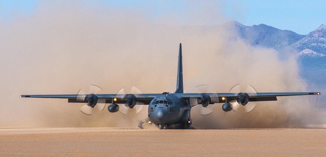 A C-130 Hercules from the 700th Airlift Squadron lands on a dry lake bed near Nellis Air Force Base, Nev. during Red Flag 16-2 March 5, 2016. Red Flag is an exercise hosted by Nellis Air Force Base, Nev. that provides aircrews an opportunity to experience realistic, stressful combat situations in a controlled environment to increase mission capability. (U.S. Air Force photo/Staff Sgt. Daniel Phelps)
