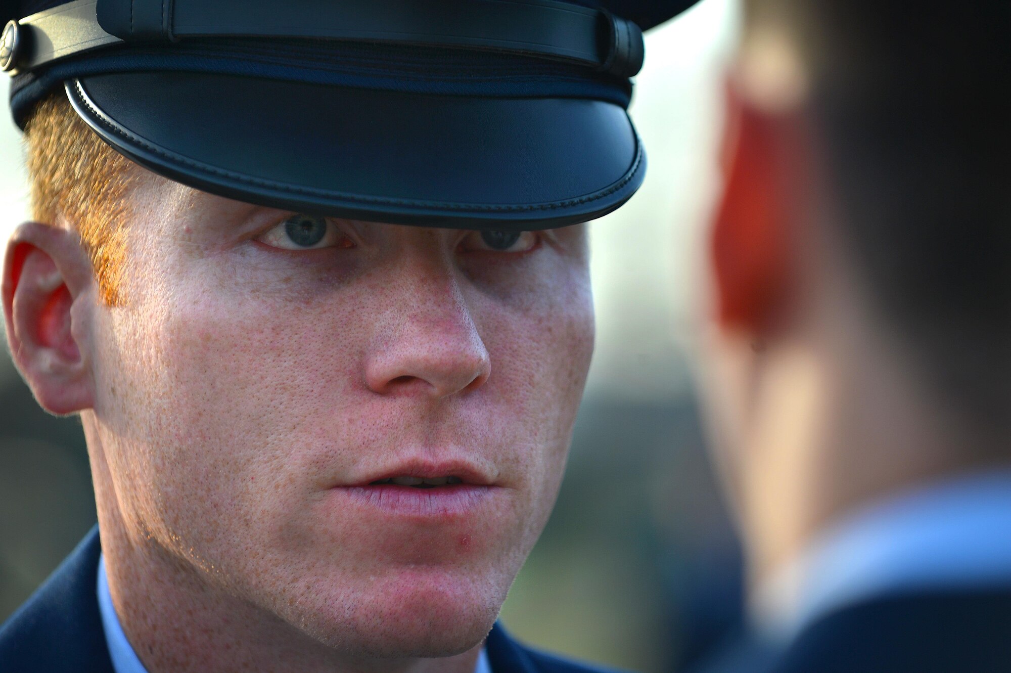 U.S. Air Force Staff Sgt. Jesse Santini, 20th Force Support Squadron Senior Master Sgt. David B. Reid Airman Leadership School instructor, inspects one of his student’s uniform of ALS Class 16-03 at Shaw Air Force Base, S.C., March 10, 2016. ALS is an in-depth leadership course designed to enhance Airmen’s leadership skills while enhancing their overall Air Force knowledge. (U.S. Air Force photo by Senior Airman Michael Cossaboom)