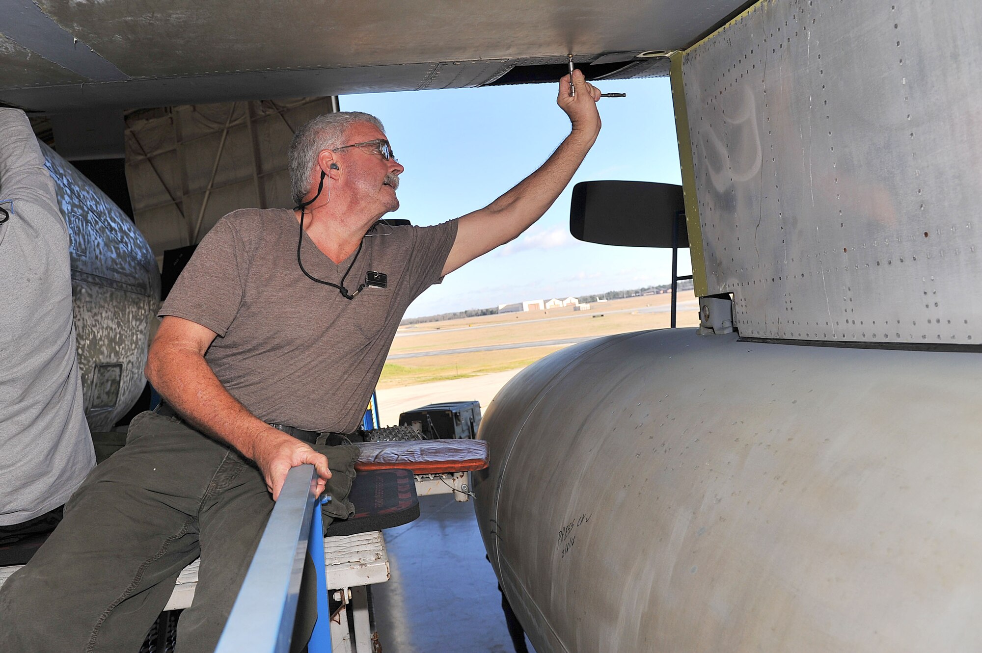 David Brown, 560th Aircraft Maintenance Squadron aircraft mechanic, services an Air Force Special Operations Command MC-130H’s external tank. Returning air power as quickly as possible to the warfighter – that’s the goal of the C-130 Air Force Special Operations Command Acceleration Team at Robins Air Force Base, Ga. These high-demand aircraft are a direct result of a team effort that once again showcases that Success Here = Success There! (U.S. Air Force photo by Tommie Horton) 