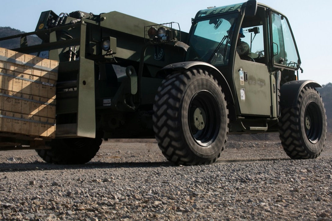 U.S. Marines with Ammunitions Co., 3rd Supply Bn., CLR-35, transport an ammo resupply, March 11, 2016, during Exercise Ssang Yong 2016 in Pohang, South Korea. Ssang Yong 16 is a biennial military exercise focused on strengthening the amphibious landing capabilities of the Republic of Korea, the U.S., New Zealand and Australia. (U.S. Marine Corps photo by Sgt. Briauna Birl/RELEASED)