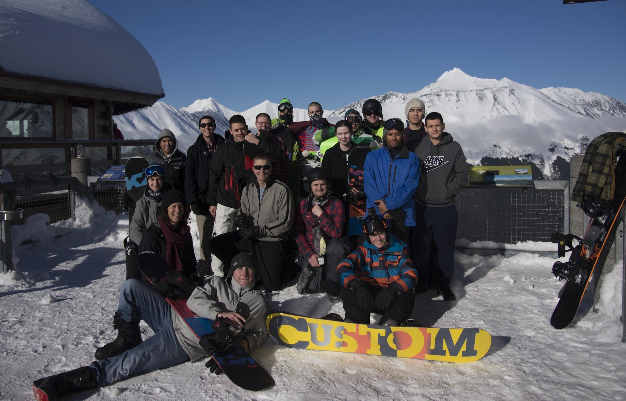 Airmen from Eielson Air Force Base, Alaska, pose at the top of Alyeska Ski Resort March 3, 2016, Girdwood, Alaska. The group visited the resort as part of a chapel-sponsored event. (U.S. Air Force photo by Senior Airman Joshua Weaver/Released)