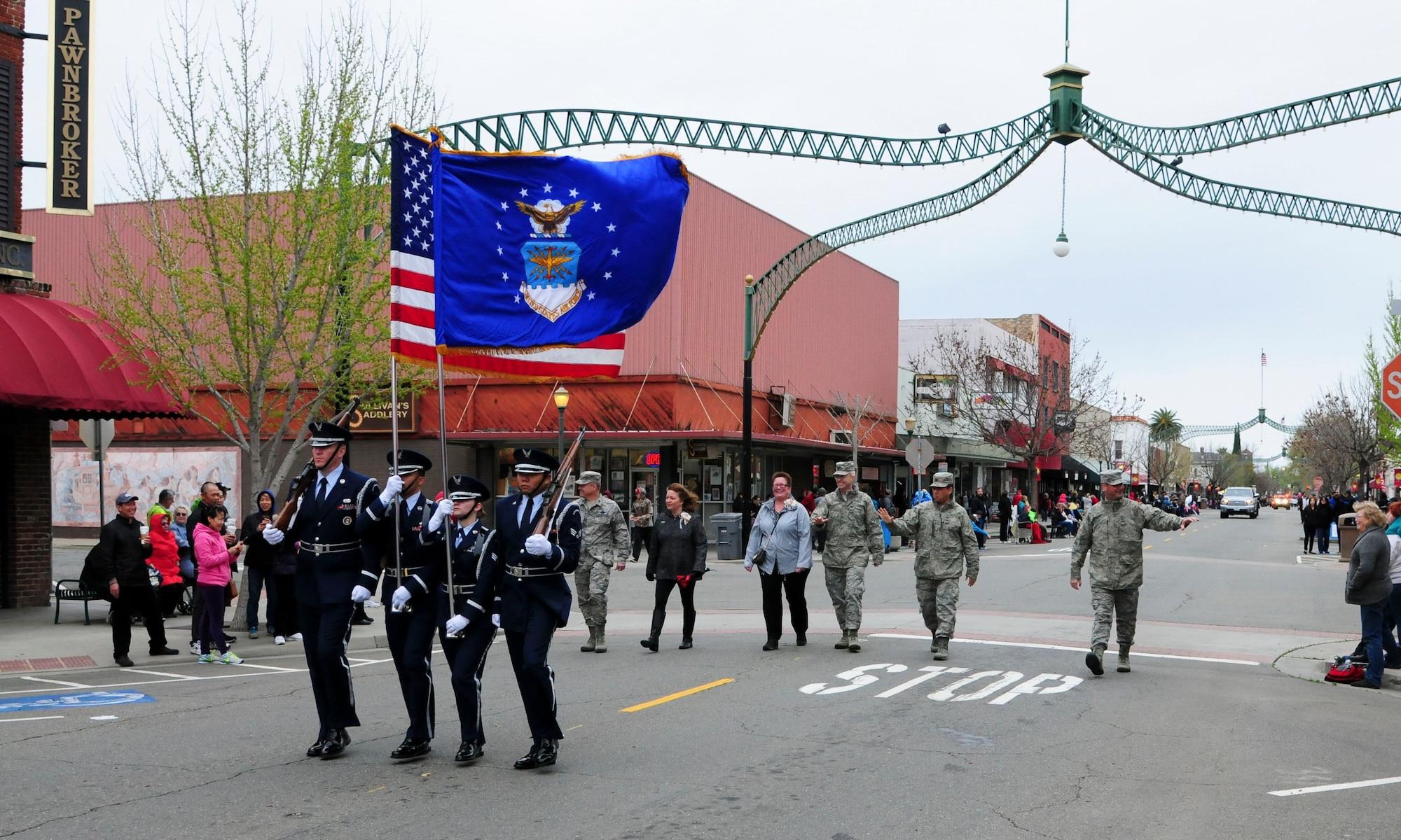 Beale Air Force Base Honor Guard and 9th Reconnaissance Wing leadership walk in the 136th Bok Kai Festival Parade in Marysville, California, Mar. 12, 2016. Beale has participated in the parade for more than 20 years. The festival celebrates the Chinese Water God of the North. 