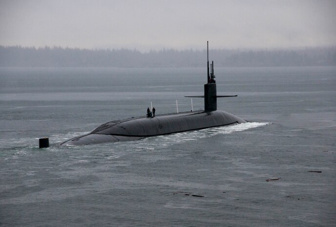 PUGET SOUND, Wash. (March 13, 2016) - The Ohio-class ballistic-missile submarine USS Kentucky (SSBN 737) departs Naval Base Kitsap-Bangor for the boat's first strategic deterrent patrol since 2011. The boat recently completed a 40-month Engineered Refueling Overhaul, which will extend the life of the submarine for another 20 years. (U.S. Navy photo by Mass Communication Specialist 2nd Class Amanda R. Gray/Released)