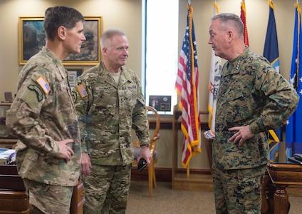 Marine Corps Gen. Joseph F. Dunford Jr., chairman of the Joint Chiefs of Staff, right, meets with Army Gen. Joseph L. Votel, commander of U.S. Special Operations Command, and Army Lt. Gen. Raymond Anthony Thomas III, commander of Joint Special Operations Command, center, at Socom headquarters on MacDill Air Force Base, Fla., March 11, 2016. DoD photo by Navy Petty Officer 2nd Class Dominique A. Pineiro