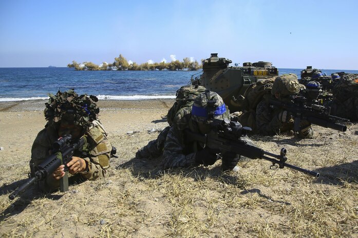 U.S. Marines, New Zealand Soldiers, Republic of Korea Marines and Australian Soldiers provide cover during an amphibious assault rehearsal on Doksukri Beach,  March 11, 2016, during exercise Ssang Yong 16. Ssang Yong is a biennial military exercise focused on strengthening the amphibious landing capabilities of the Republic of Korea, the U.S., New Zealand and Australia. (U.S. Marine Corps photo by Cpl. Allison Lotz/Released)