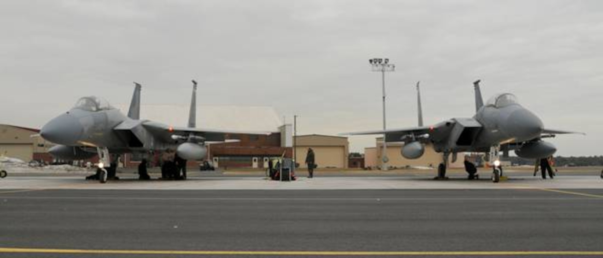 Two F-15C Eagles from the 104th Fighter Wing, Barnes Air National Guard Base, sit on the ramp during an alert scramble practice. (Courtesy photo)