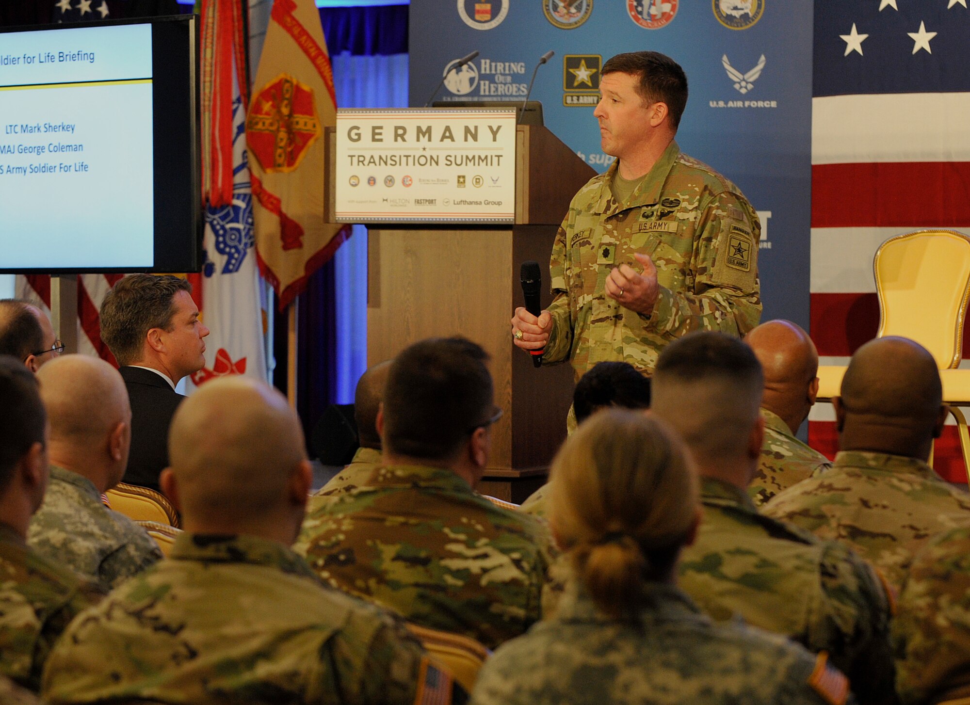 Lt. Col. Mark Sherkey, North East U.S. and Europe U.S. Army Soldier For Life regional director, talks during a Hiring Our Heroes Kaiserslautern Military Community Transition Summit March 10, 2016, at Vogelweh Military Complex, Germany. Leaders spoke during the summit to empower transitioning service members to take control of their futures and make informed decisions. (U.S. Air Force photo/Airman 1st Class Larissa Greatwood)