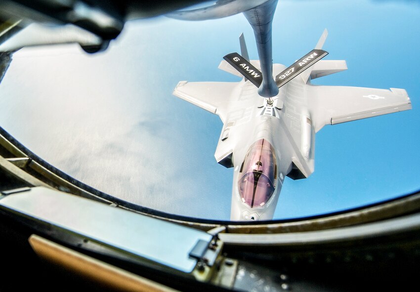 An F-35A Lightning II pilot hovers while attached to a KC-135 Stratotanker boom during a refuel mission over the Gulf of Mexico near Eglin Air Force Base, Fla. March 3. During the morning mission, local media and F-35 maintainers from the 33rd Fighter Wing looked on as the MacDill Air Force Base KC-135 crew offloaded approximately 48,100 pounds of jet fuel to seven F-35As. (U.S. Air Force photo/Ilka Cole) 
