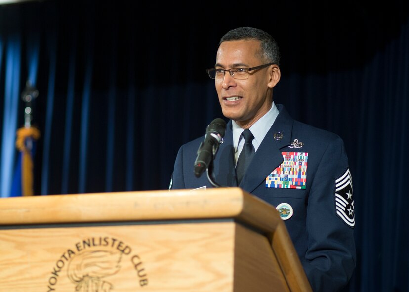 Chief Master Sgt. Terrence Greene, United States Forces Japan and 5th Air Force incoming command chief, gives a speech during a change of responsibility ceremony at Yokota Air Base, Japan, March 10, 2016. Lt. Gen. John Dolan, United States Forces Japan and 5th Air Force commander, presided over the ceremony. (U.S. Air Force photo by Osakabe Yasuo/Released)