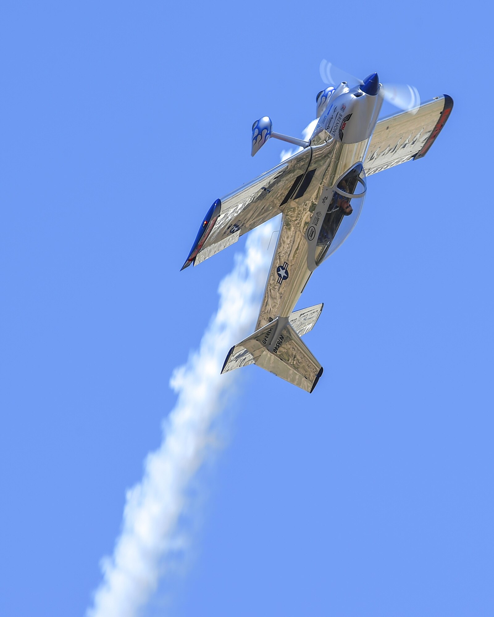 Joe Shetterly, Van’s RV-8 pilot, performs an aerobatic demonstration during the Thunder and Lightning over Arizona Open House at Davis-Monthan Air Force Base, Ariz., March 12, 2016. The open house featured aerial demonstrations from various teams and numerous static displays allowing the public to gain a better understanding of the Air Force. (U.S. Air Force photo by Senior Airman Chris Massey/Released)
