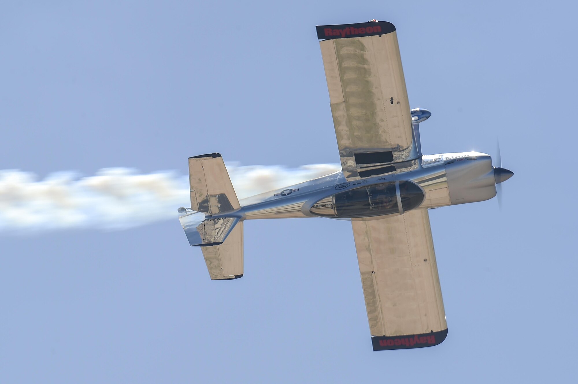 Joe Shetterly, Van’s RV-8 pilot, performs an aerobatic demonstration during the Thunder and Lightning over Arizona Open House at Davis-Monthan Air Force Base, Ariz., March 13, 2016. The open house featured aerial demonstrations from various teams and numerous static displays allowing the public to gain a better understanding of the Air Force. (U.S. Air Force photo by Senior Airman Chris Massey/Released)