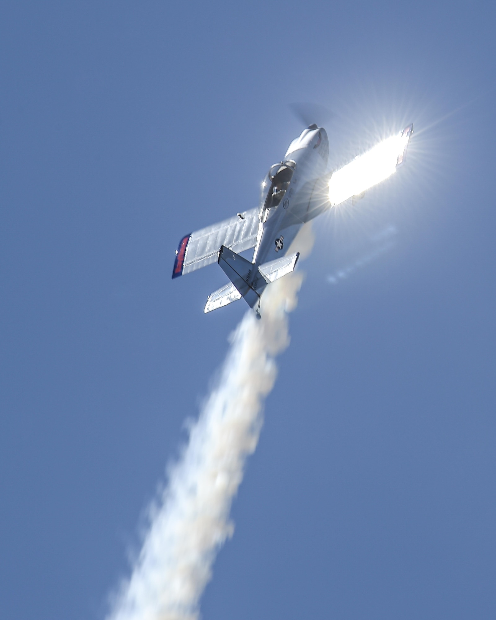 Joe Shetterly, Van’s RV-8 pilot, performs an aerobatic demonstration during the Thunder and Lightning over Arizona Open House event at Davis-Monthan Air Force Base, Ariz., March 13, 2016. The open house featured aerial demonstrations from various teams and numerous static displays allowing the public to gain a better understanding of the Air Force. (U.S. Air Force photo by Senior Airman Chris Massey/Released)