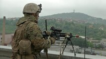 A Fleet Antiterrorism Security Team (FAST) Marine stands watch at the U.S. Embassy in Sarajevo, Bosnia and Herzegovina, during a week of training in May 2015. 