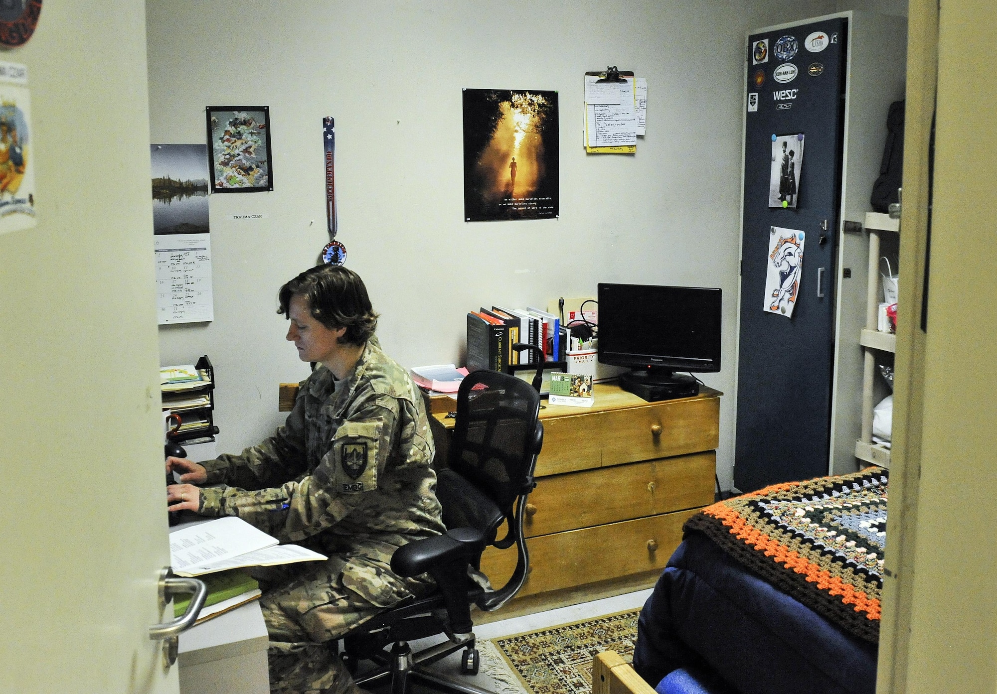 Maj. (Dr.) Valerie Sams, 455th Expeditionary Medical Group trauma czar, lives and works in the Craig Joint-Theater Hospital in order to rapidly respond to her patients at Bagram Air Field, Afghanistan, March 5, 2016. The trauma czar is responsible for coordinating patient care and making the final decision on treatment. (U.S. Air Force photo by Tech. Sgt. Nicholas Rau)
