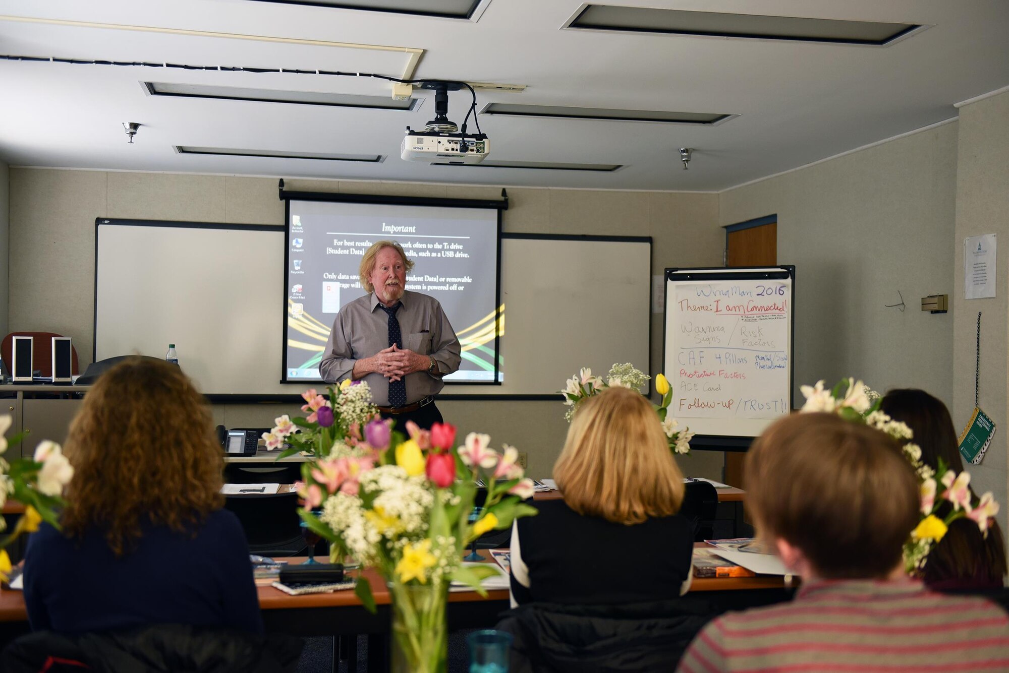 Mr. Christopher Lewis provides a briefing on resiliency to members of the 512th Airlift Wing Key Spouse Program at Dover Air Force Base, Del., Mar. 5, 2016. The 512th AW Key Spouse Program is a Unit Commander appointed
volunteer spouses' organization providing outreach and support net to family members of deployed reservists. Training, like the resiliency briefing that Lewis provided, is offered to volunteers throughout the program. (U.S. Air Force photo/1st Lt Steve Lewis)
