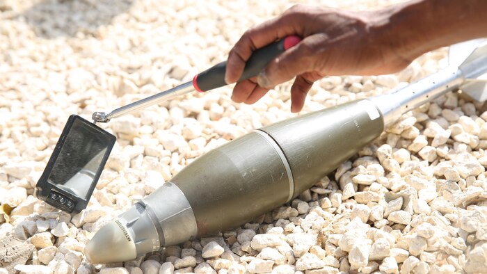 Senegalese soldiers learn how to use a reconnaissance kit to properly identify various types of ordnance, March 8, 2016 at an engineer base in Bargny, Senegal. Since Feb. 15, a group of explosive ordnance disposal technicians with Special-Purpose Marine Air-Ground Task Force Crisis Response-Africa, began assisting Senegalese engineers as part of the Humanitarian Mine Action Program through what is called a train-the-trainer program. 