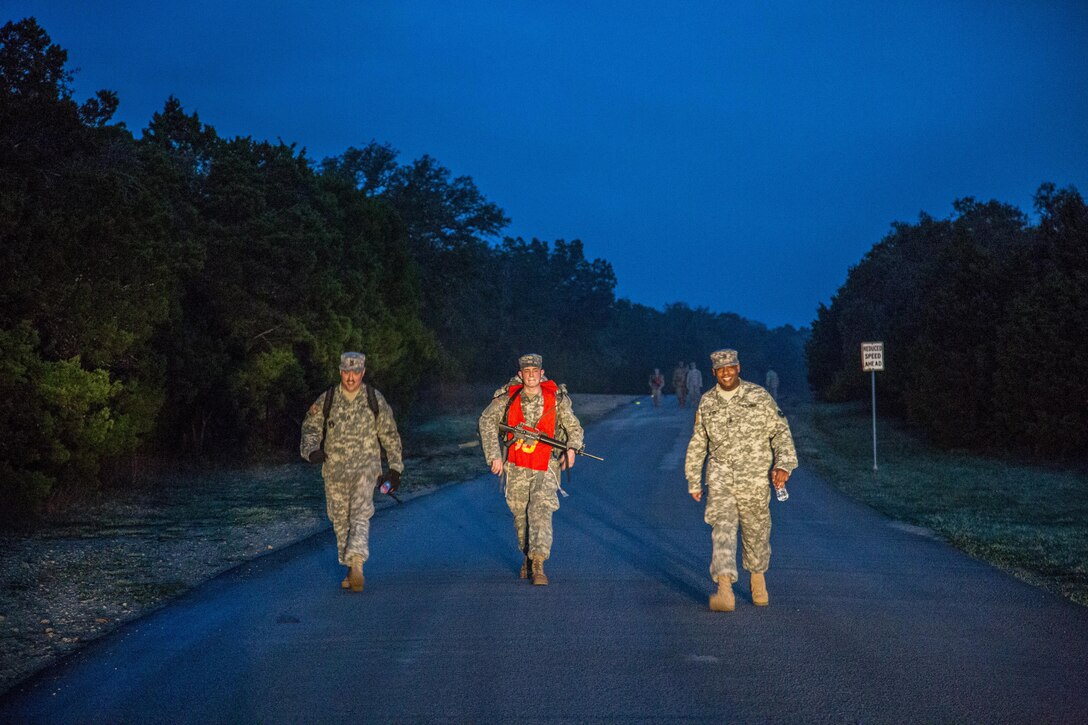 U.S. Army Soldiers from the 80th Training Command compete in a six mile ruck march during the 80th Training Command Best Warrior Competition (BWC) 2016, in conjunction with 99th Regional Support Command, at Camp Bullis, Texas, March 11, 2016. The BWC is an annual competition to identify the strongest and most well-rounded Soldiers through the accomplishment of physical and mental challenges, as well as basic Soldier skills. (U.S. Army photo by Spc. Steven Cope/Released).