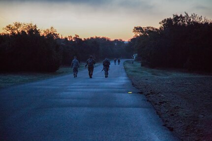 U.S. Army Soldiers from the 80th Training Command compete in a six-mile ruck march during the 80th Training Command Best Warrior Competition (BWC) 2016, in conjunction with 99th Regional Support Command, at Camp Bullis, Texas, March 11, 2016. The BWC is an annual competition to identify the strongest and most well-rounded Soldiers through the accomplishment of physical and mental challenges, as well as basic Soldier skills. (U.S. Army photo by Spc. Steven Cope/Released).