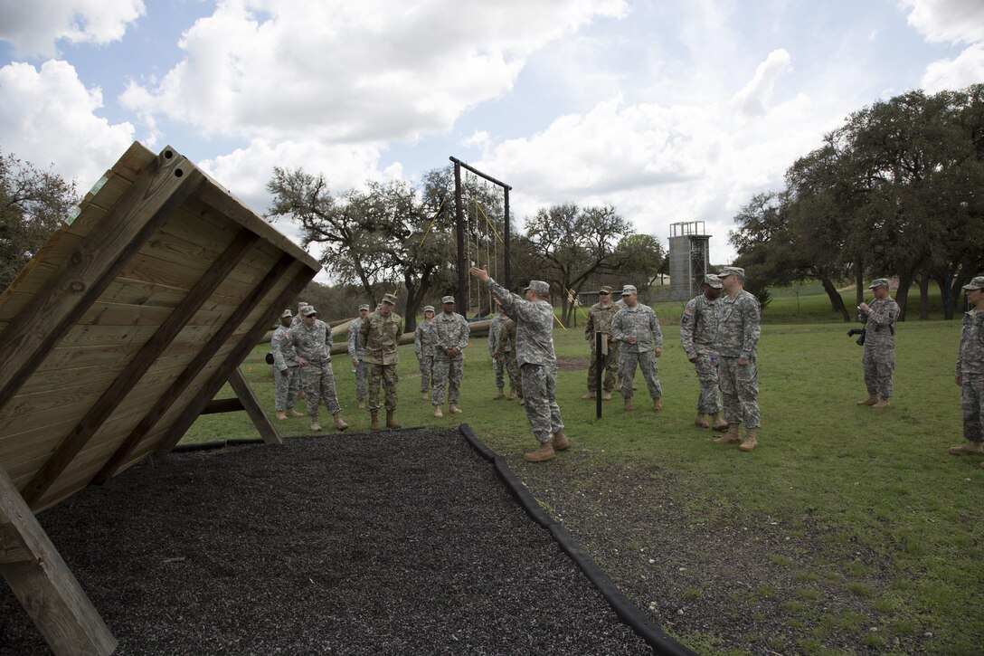 U.S. Army Master Sgt. Steve Guevara assigned to the 14th Battalion 95th Regiment of Grand Prairie, Texas, Briefs the safeties prior to the Obstacle Course event during the 80th Training Command 2016 Best Warrior Competition (BWC) in conjunction with 99th Regional Support Command at Camp Bullis, Texas, March 11, 2016. The BWC is an annual competition to identify the strongest and most well-rounded Soldiers through the accomplishment of physical and mental challenges, as well as basic Soldier skills. (U.S. Army photo by Cpl. Cope Steven).
