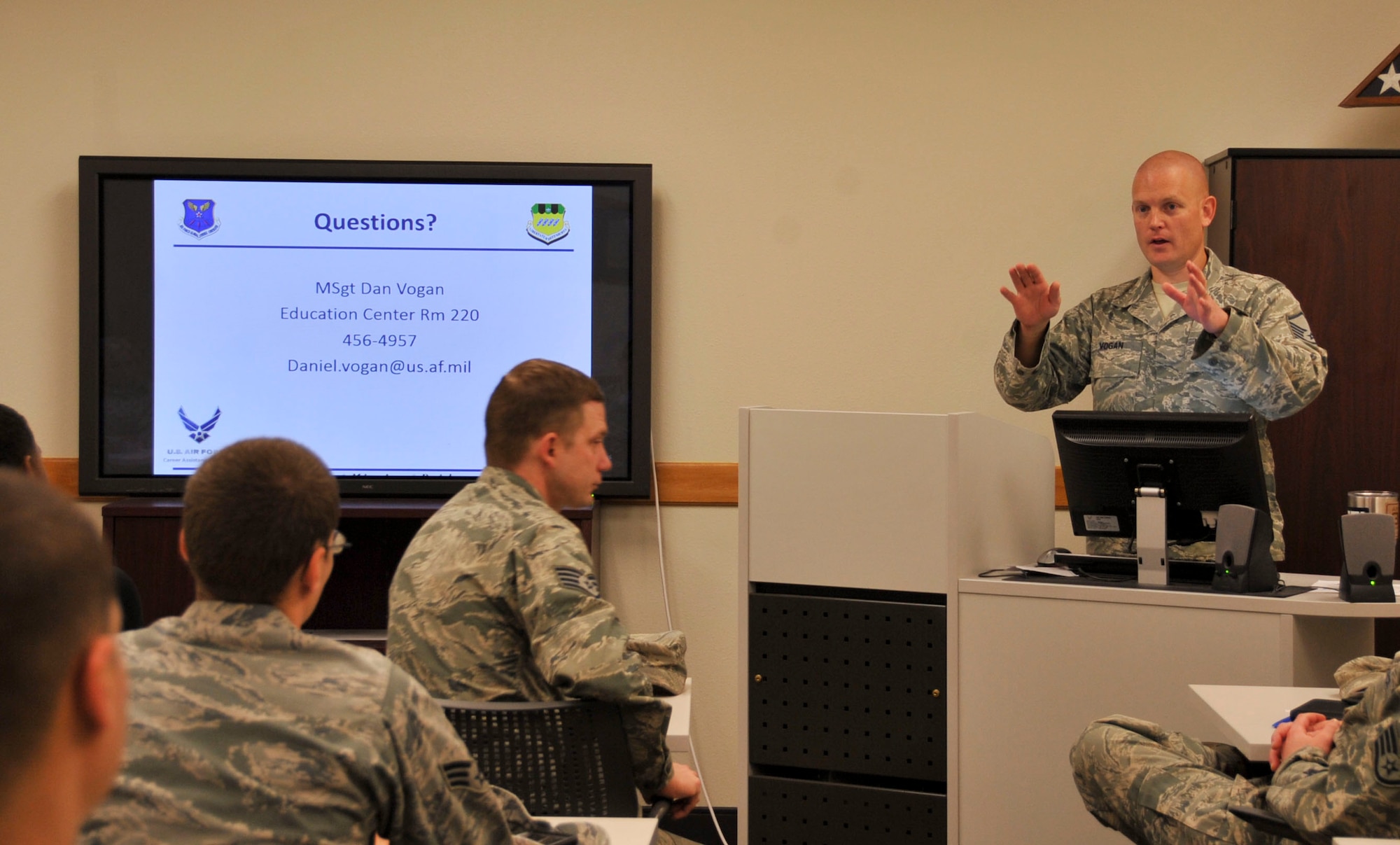 Master Sgt. Daniel Vogan, 2nd Force Support Squadron career assistance advisor, answers Airmen’s questions during a retraining seminar at Barksdale Air Force Base, La., March 3, 2016. Vogan encouraged Airmen to ask questions, talk to their leadership, research the careers they are interested in and make sure they understand the process of retraining. (U.S. Air Force photo/Senior Airman Amanda Morris)