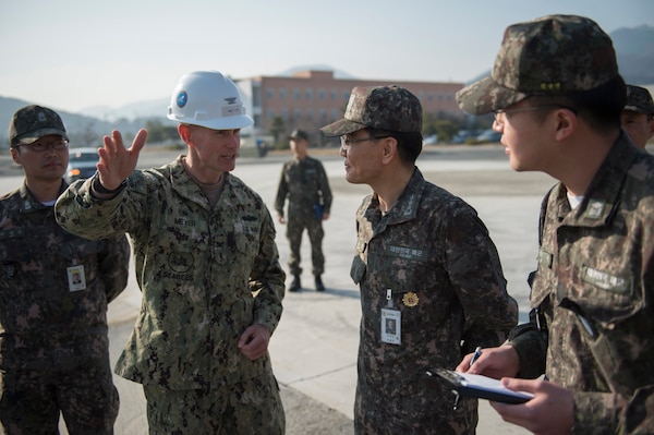 U.S. Navy Capt. James Meyer, commodore of the 30th Naval Construction Regiment, speaks with South Korea Navy Vice Adm. Jung, Jin-soep, during exercise Foal Eagle 2016 in Jinhae, South Korea, March 15, 2016. Navy photo by Chief Lowell Whitman