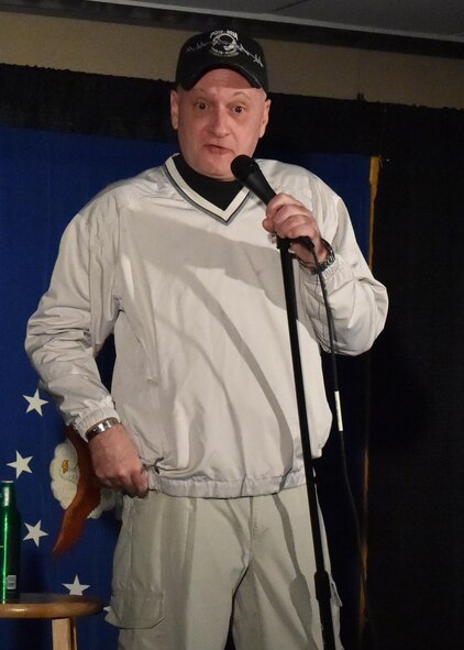 Feature entertainer Tracy Cooper performs for the comedy show, here March 5, 2016. Cooper is a retired Air Force member. The comedy show was sponsored by the 910th Chief's Group. (U.S. Air Force photo by Staff Sgt. Rachel Kocin)