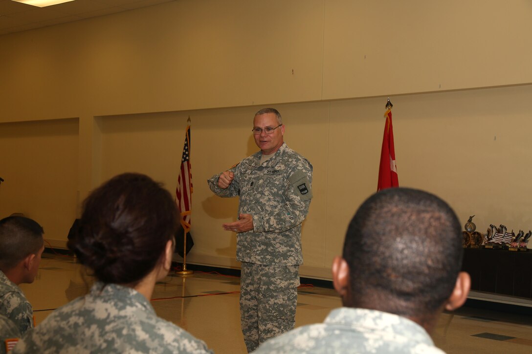 U.S. Army U.S. Army Sgt. Maj. John Lee, assigned to 800th Logistic Support Brigade, Mustang, Okla., talks all the competitors during the 80th Training Command 2016 Best Warrior Competition (BWC) in conjunction with 99th Regional Support Command at Camp Bullis, Texas, March 11, 2016. The BWC is an annual competition to identify the strongest and most well-rounded Soldiers through the accomplishment of physical and mental challenges, as well as basic Soldier skills. (U.S. Army photo by Spc. Darnell Torres/Released).