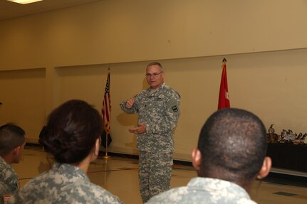 U.S. Army U.S. Army Sgt. Maj. John Lee, assigned to 800th Logistic Support Brigade, Mustang, Okla., talks all the competitors during the 80th Training Command 2016 Best Warrior Competition (BWC) in conjunction with 99th Regional Support Command at Camp Bullis, Texas, March 11, 2016. The BWC is an annual competition to identify the strongest and most well-rounded Soldiers through the accomplishment of physical and mental challenges, as well as basic Soldier skills. (U.S. Army photo by Spc. Darnell Torres/Released).