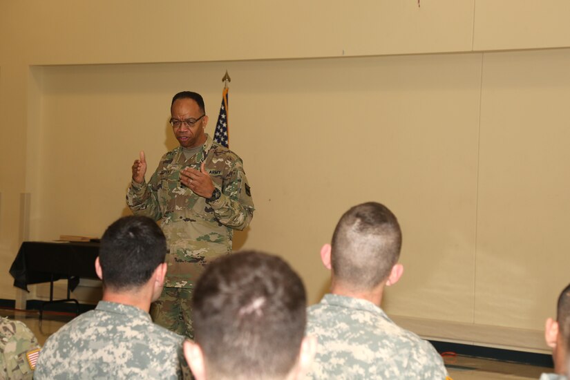U.S. Army Maj. Gen. A.C. Roper, commander 80th Training Command talk the best warrior competitors during the 80th Training Command 2016 Best Warrior Competition (BWC) in conjunction with 99th Regional Support Command at Camp Bullis, Texas, March 11, 2016. The BWC is an annual competition to identify the strongest and most well-rounded Soldiers through the accomplishment of physical and mental challenges, as well as basic Soldier skills. (U.S. Army photo by Spc. Darnell Torres/Released).