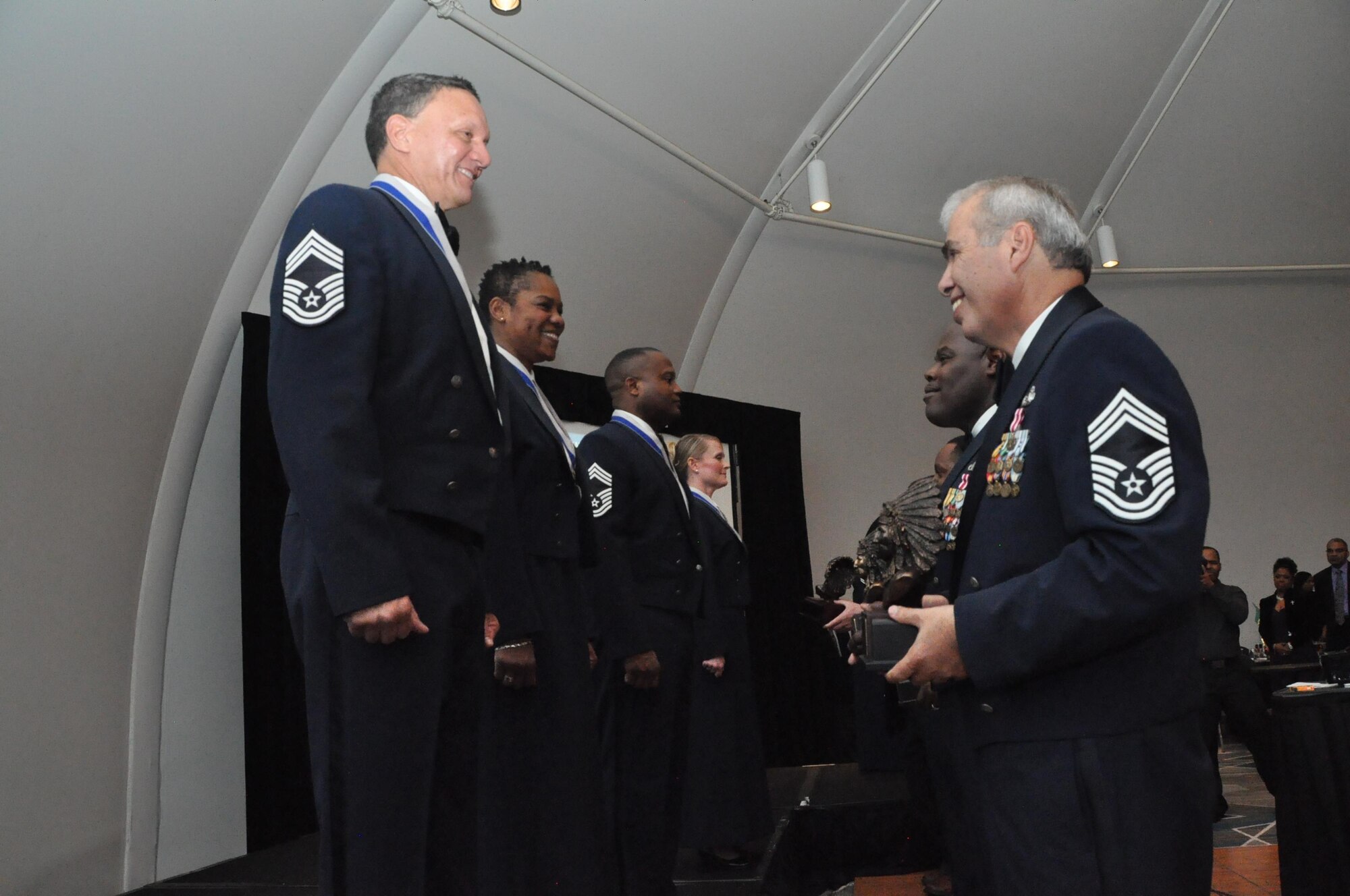 Established chief master sergeants receive the honor of welcoming the new chiefs and recognizing them for their promotion. We are pleased to recognize and welcome our outstanding senior noncommissioned officers to the top one percent of the enlisted in the United States Air Force.  (U.S. Air Force photo by Senior Airman Lauren Douglas )