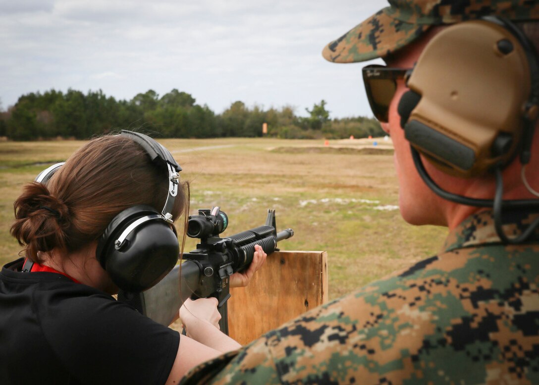 An educator from eastern Pennsylvania fires the M16A4 rifle during the Educators' Workshop on Marine Corps Recruit Depot Parris Island, S.C., March 9, 2016. The workshop provides an opportunity for the educators to see recruit training firsthand while learning about the Marine Corps. (U.S. Marine Corps photo by Sgt. Elizabeth Thurston/ Released)