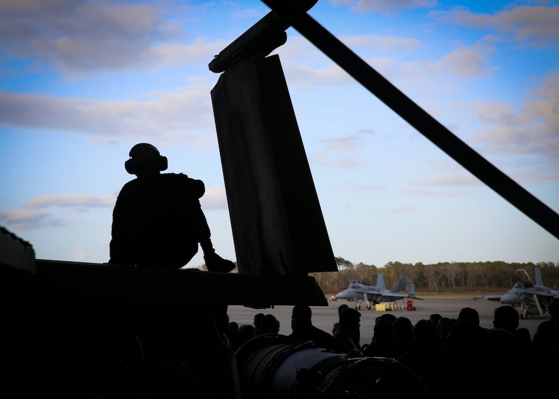 Educators from northern New York and eastern Pennsylvania view a static display of an F/A-18 Hornet during the Educators’ Workshop on Marine Corps Air Station Beaufort, S.C., March 9, 2016. The educators attend the workshop so they can better understand the Marine Corps and recruit training. (U.S. Marine Corps photo by Sgt. Elizabeth Thurston/ Released)