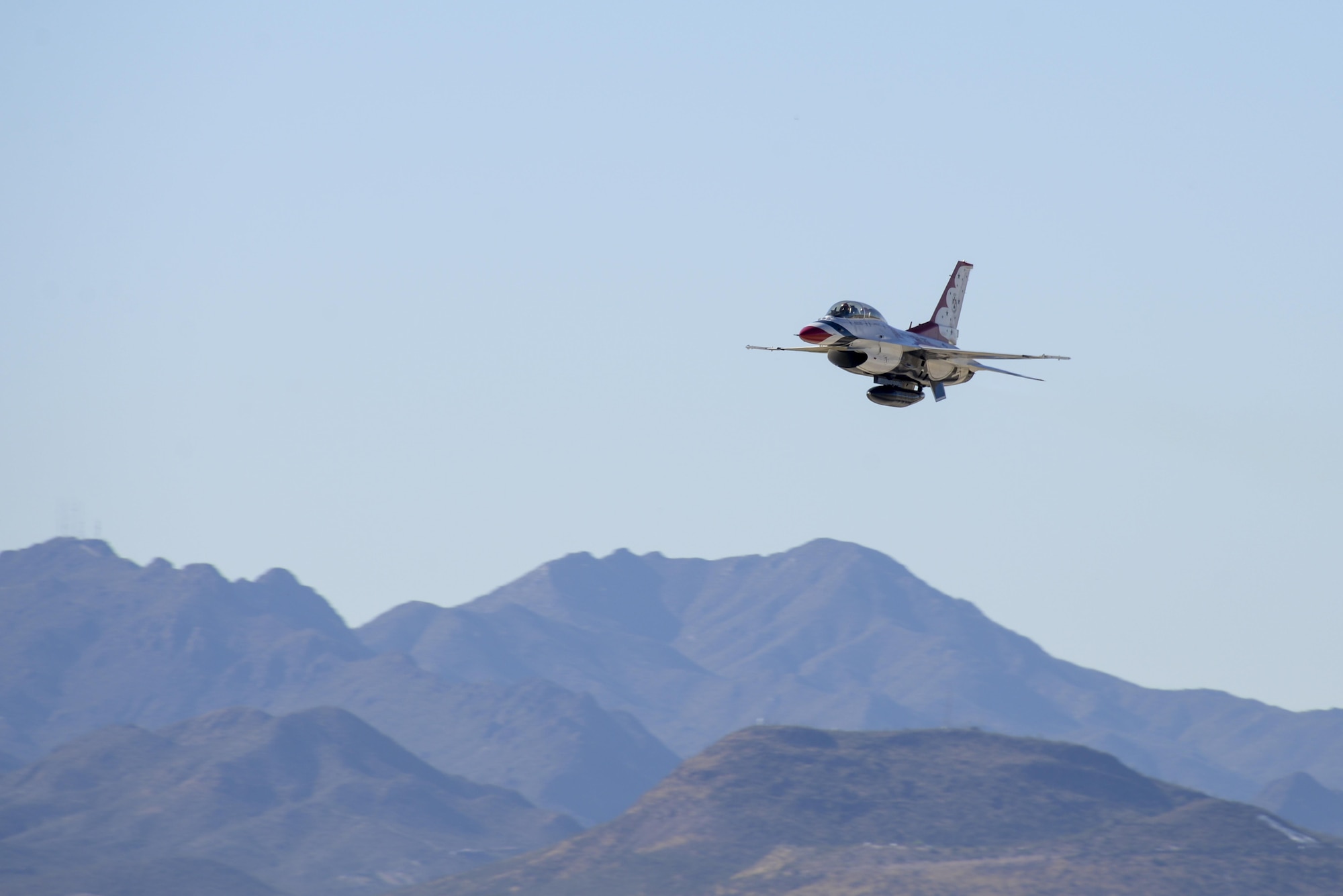 U.S. Air Force Maj. Kevin Walsh, U.S. Air Force Air Demonstration Squadron pilot and operations officer, launches Thunderbird 7, an F-16 Fighting Falcon, with Brendon Lyons, Tucson community hometown hero, in the rear seat at Davis-Monthan Air Force Base, Ariz., March 11, 2016.  Lyons was nominated as a hometown hero because of his commitment to safety and his passion to make Tucson a safer community for cyclists and motorists.  (U.S. Air Force photo by Senior Airman Chris Massey/Released)