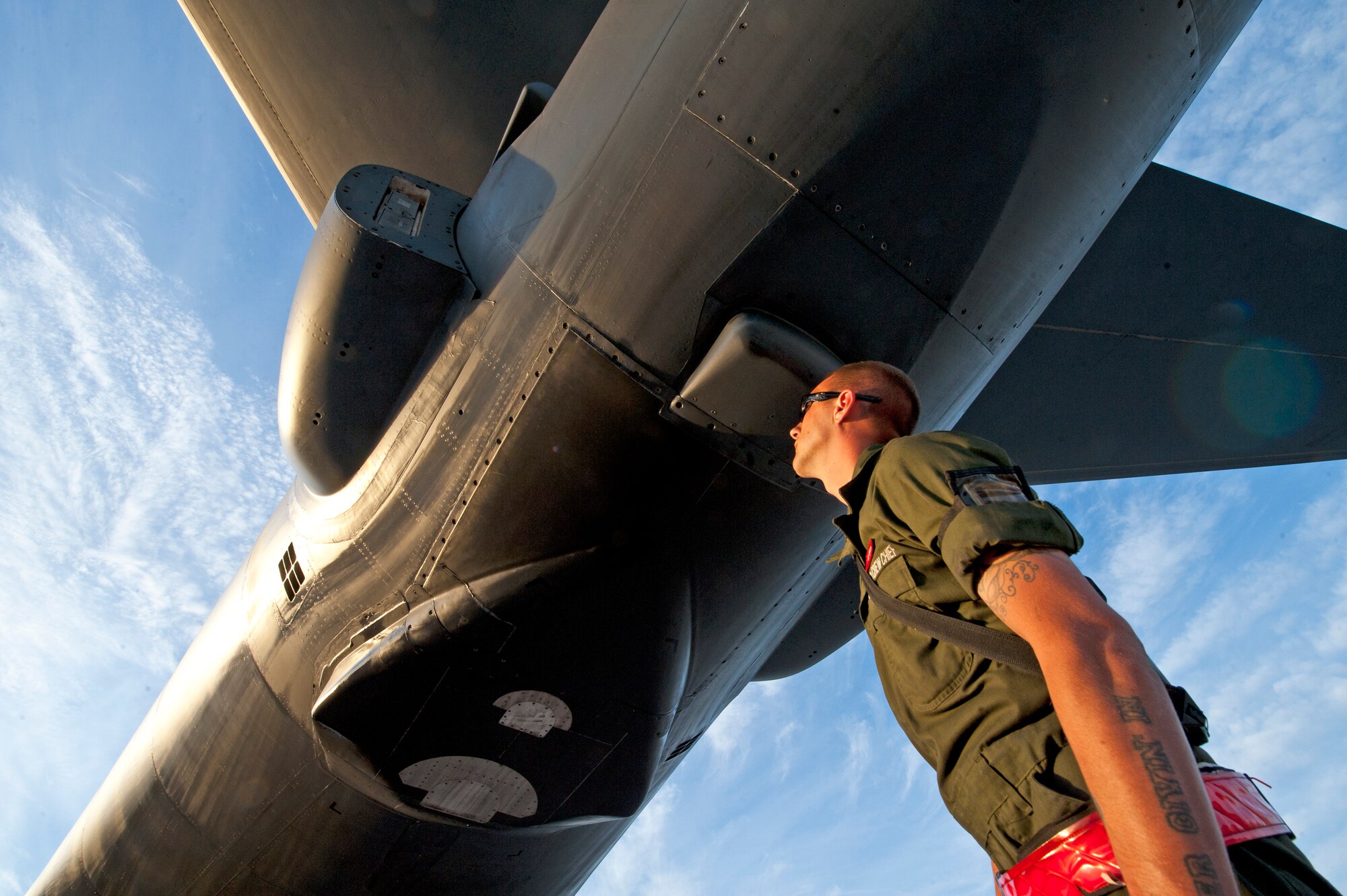 Staff Sgt. Joshua Free, a dedicated crew chief assigned to the 28th Aircraft Maintenance Squadron, checks the metal structure of a B-1 bomber prior to a Red Flag 16-2 night training sortie at Nellis Air Force Base, Nev., March 10, 2016. Red Flag exercises simulate a conflict environment in which maintainers must work diligently around the clock to ensure the safety and operability of their assigned aircraft.  (U.S. Air Force photo by Senior Airman Joshua Kleinholz/Released)