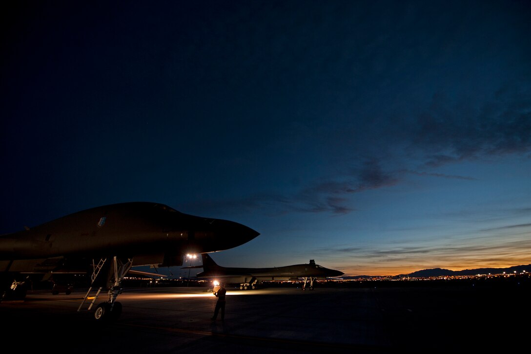 B-1 bombers assigned to the 28th Bomb Wing receive pre-flight preparations prior to a Red Flag 16-2 night training sortie at Nellis Air Force Base, Nev., March 10, 2016. Night missions play a crucial role in Red Flag exercises, allowing aircrews and maintainers the opportunity to test their skills in challenging low-light conditions. (U.S. Air Force photo by Senior Airman Joshua Kleinholz/Released)