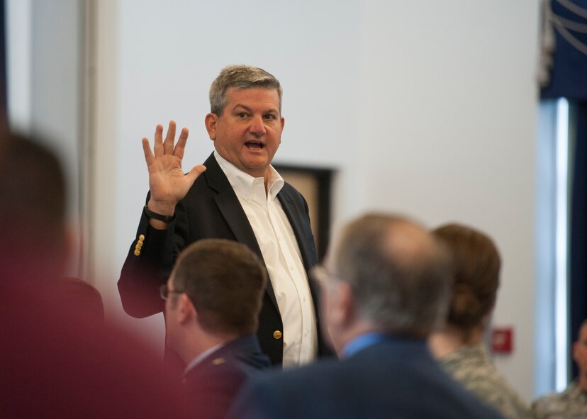 Retired Lt. Gen. Vern “Rusty” Findley, Airlift/Tanker Association executive director, speaks to Team Dover Airmen at a Leadership Luncheon March 4, 2016, at the Landings on Dover Air Force Base, Del. Findley spoke on his experiences as the 437th Airlift Wing commander at Charleston AFB, S.C. during the start of Operation Enduring Freedom. (U.S. Air Force photo/Senior Airman Zachary Cacicia)