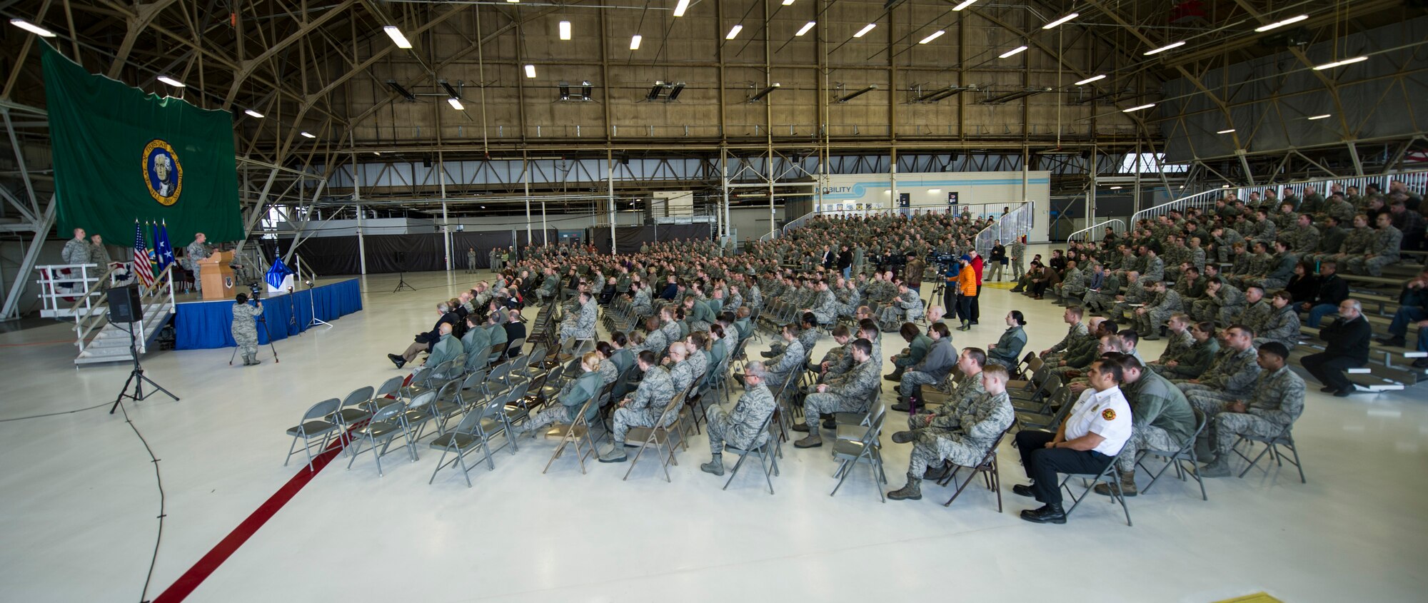 U.S. Air Force Lt. Gen. Stephen W. Wilson (at podium), U.S. Strategic Command (USSTRATCOM) deputy commander, provides remarks to members of the 92nd and 141st Air Refueling Wings during an award ceremony honoring the 92nd Air Refueling Wing at Fairchild Air Force Base, Wash., March 14, 2016. During the ceremony, Wilson and Mr. W. Gary Gates (not pictured), Strategic Command Consultation (SCC) Committee member, presented the 2015 Omaha Trophy, strategic aircraft category, to U.S. Air Force Col. Brian McDaniel (not pictured), 92nd Air Refueling Wing commander, and other base leaders in recognition of the wing’s contributions to USSTRATCOM’s global strategic missions. The Omaha Trophy, which dates back to the U.S. Air Force’s Strategic Air Command, was originally created by the SCC in 1971. At the time, a single trophy was presented annually as a token of appreciation to USSTRATCOM’s best wing. Since then, the tradition has evolved to unit-level awards that recognize the command’s premier intercontinental ballistic missile (ICBM) wing, ballistic missile submarine, strategic bomber wing and global operations (space/cyberspace) unit. This year, a new category was added to include the combatant command’s top strategic aircraft wing. (U.S. Air Force photo by Airman 1st Class Sean Campbell)
