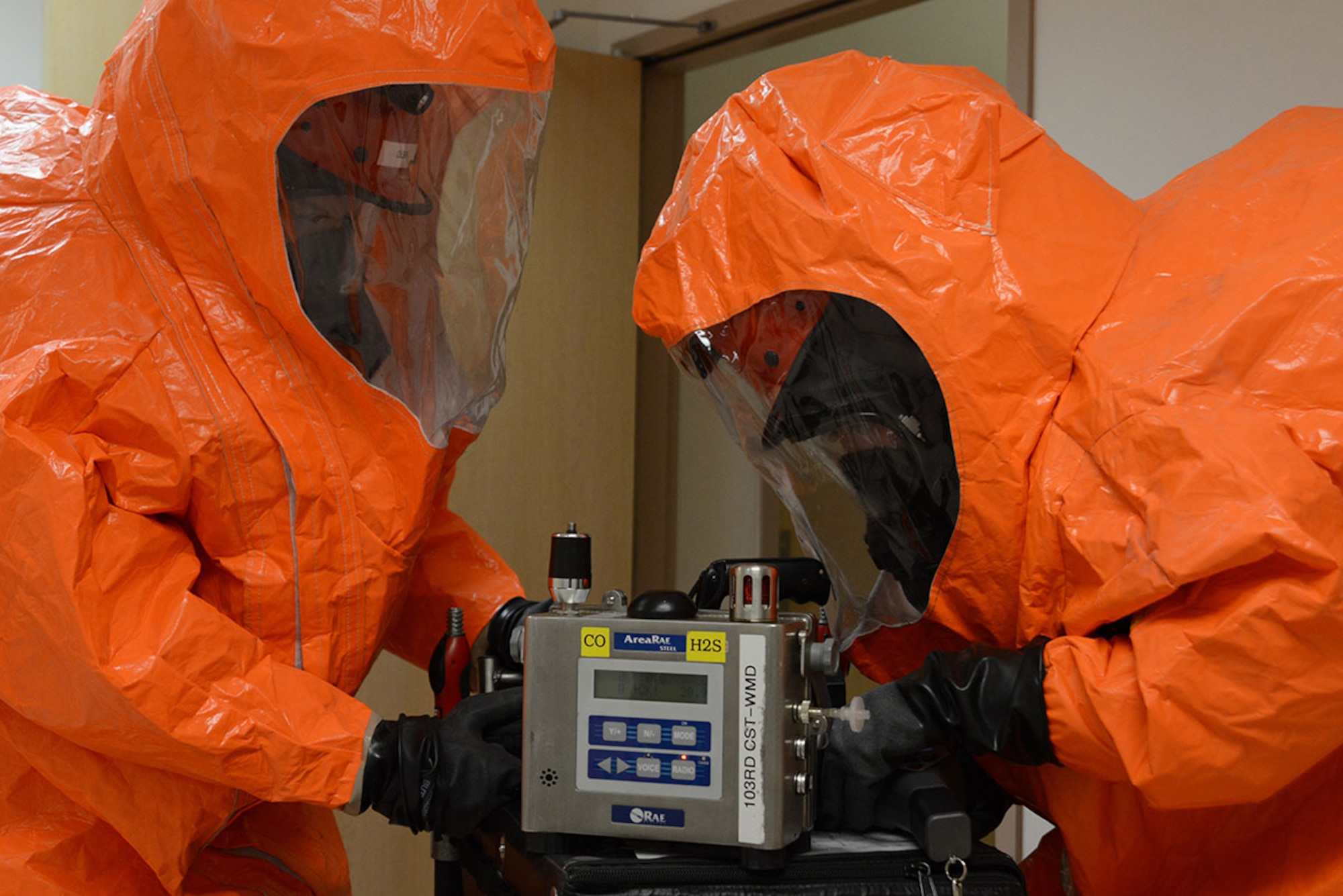 Members of the Alaska National Guard’s 103d Civil Support Team retrieve equipment from their cart during their technical proficiency evaluation test for federal recognition as a regional chemical, biological, radiological and nuclear response unit in Anchorage, Alaska, Feb. 16, 2016. (U.S. Air Force photo by Airman 1st Class Christopher R. Morales)