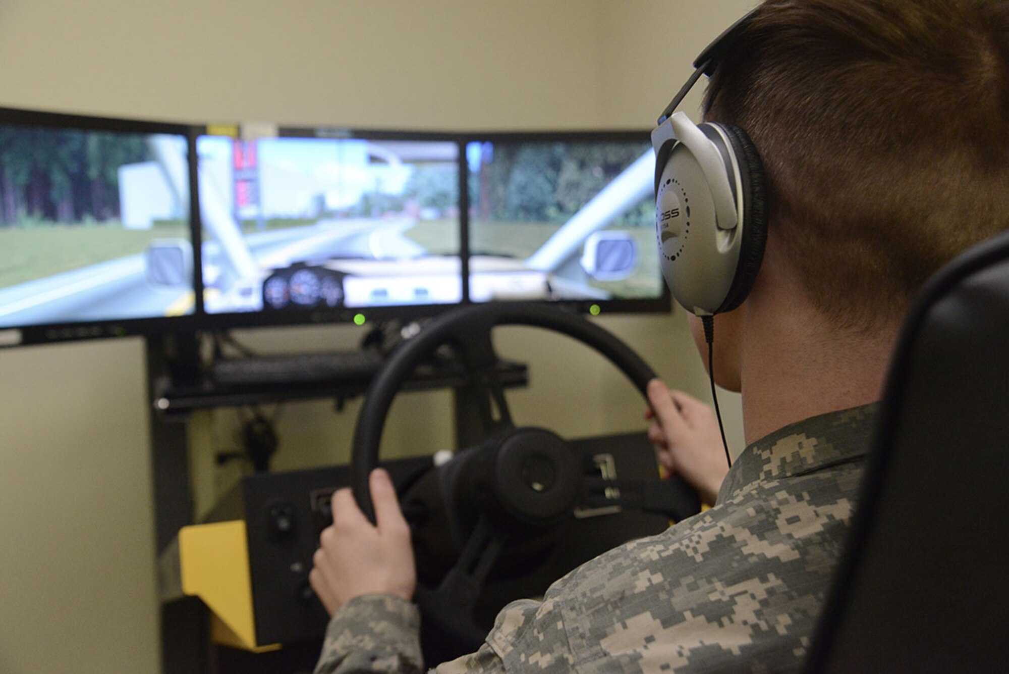 A Soldier takes a cognitive hand-eye coordination test on a virtual driving simulator at the traumatic brain injury clinic in the Joint Base Elmendorf-Richardson hospital, March 2, 2016. A physician or nurse practitioner develops a treatment plan by testing patients on multiple cognitive levels and keeping in mind their physical and emotional symptoms as well. (U.S. Air Force photo by Airman 1st Class Christopher R. Morales)