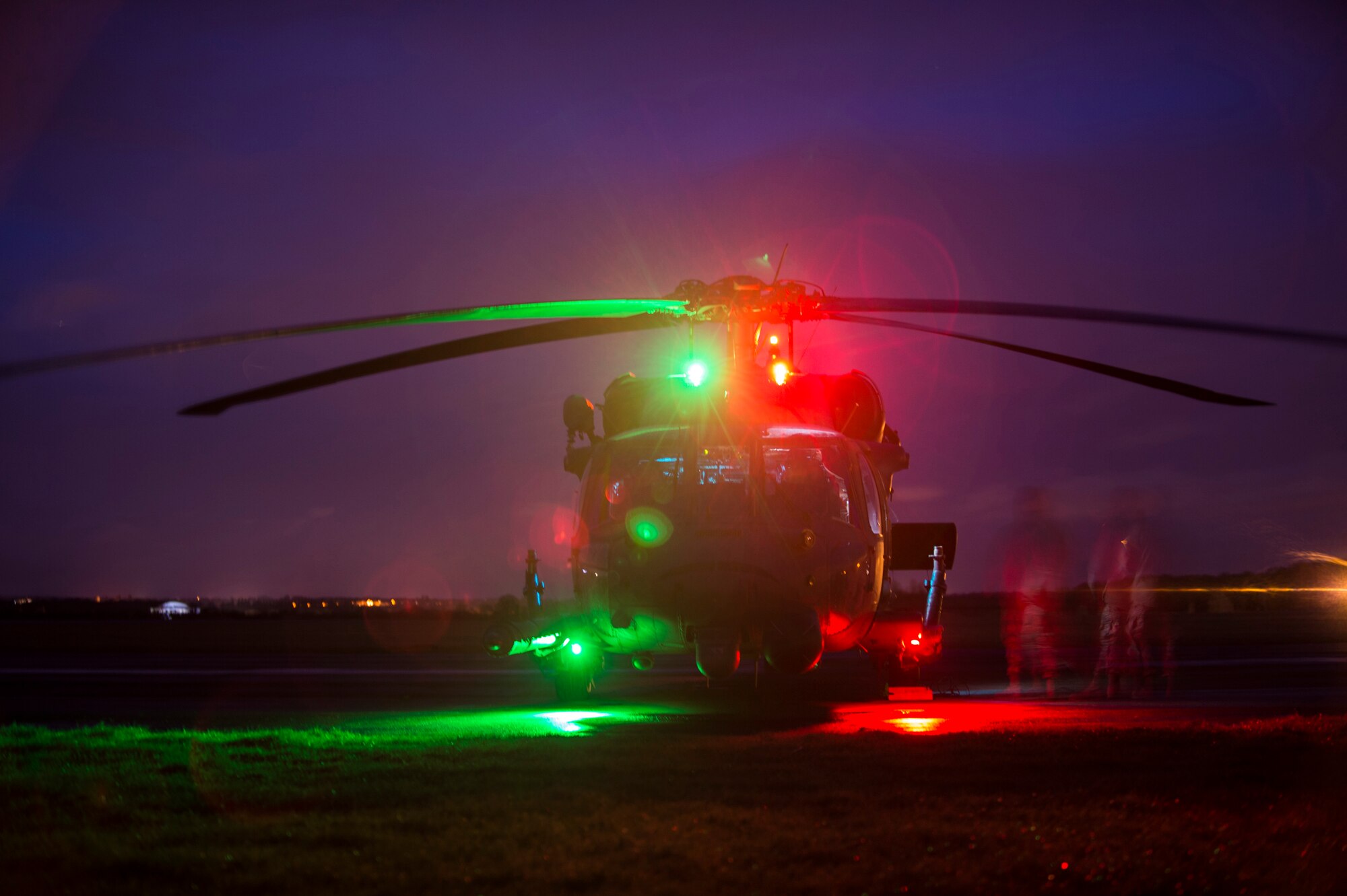 Members of the 56th Rescue Squadron conduct post-flight inspections on an HH-60G Pave Hawk during exercise Voijek Valour at Hullavington Airfield, England, March 2, 2016. Pave Hawks are equipped with a retractable, in-flight refueling probe, internal auxiliary fuel tanks, two crew-served 7.62mm or .50 caliber machineguns, and an 8,000-pound capacity cargo hook in order to fly longer missions, defend personnel, and to recover personnel during rescues. (U.S. Air Force photo/Staff Sgt. Emerson Nuñez)