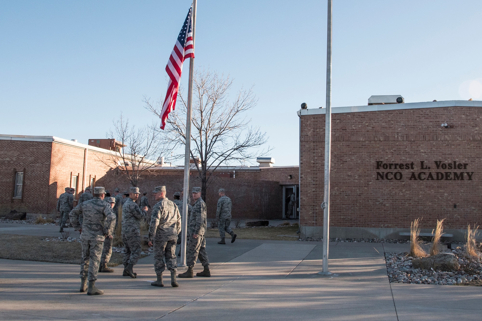 PETERSON AIR FORCE BASE, Colo. – Forrest L. Vosler Noncommissioned Officer Academy staff and students begin the new Intermediate Learning Experience course at Peterson Air Force Base, Colo., March 9, 2016. The old course, Legacy, which was instructor-centered with specific lesson plans, papers and speeches is beginning to be replaced at all of the Air Force NCOAs. The ILE course is more student-centered with group projects and problem solving situations. Vosler NCOA is the third to transition to ILE. (U.S. Air Force photo by Staff Sgt. Tiffany DeNault)